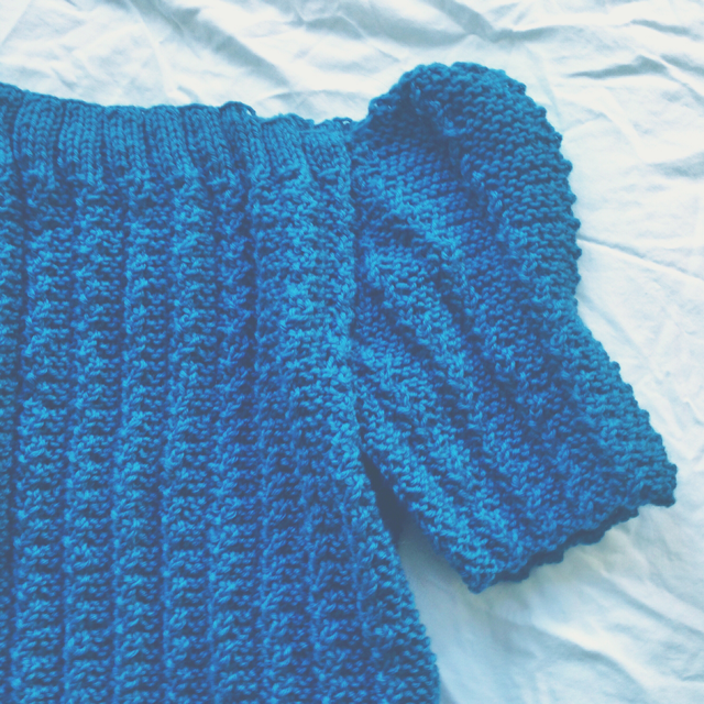 Blue sweater with puffed sleeves